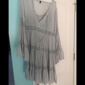 Periwinkle Perry dress low neck. Bell sleeves